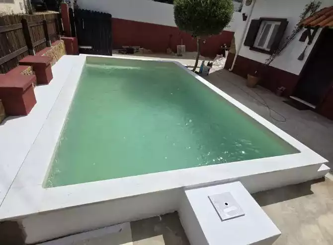 Acabamento em mosaico verde água